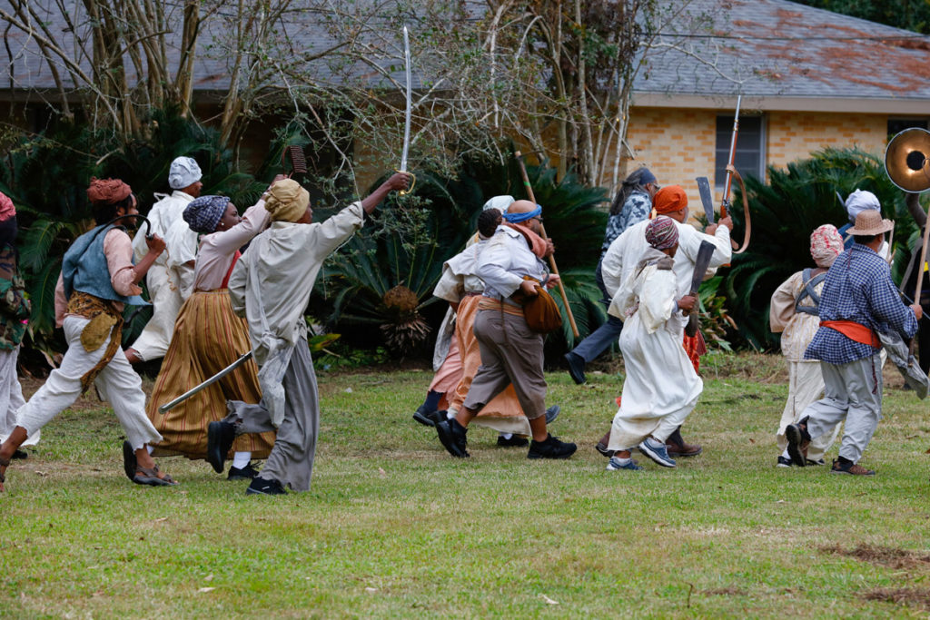 Documentation of Slave Rebellion Reenactment, a community engaged performance initiated by Dread Scott. Performend November 8-9, 2019 in the outskirts of New Orelans. Photographed by Soul Brother