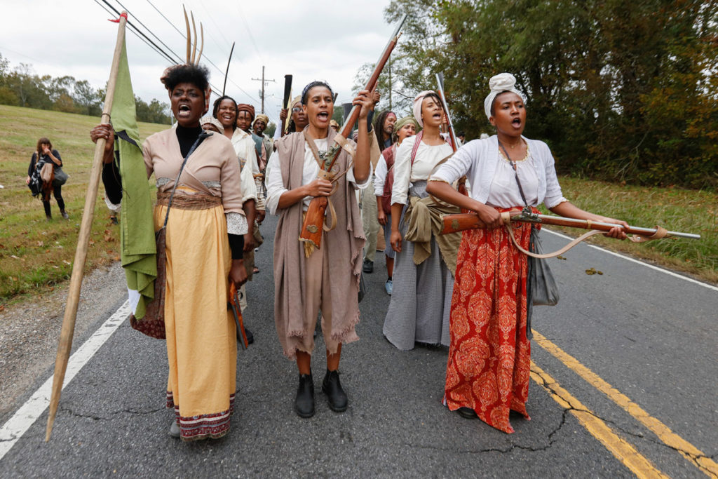 Documentation of Slave Rebellion Reenactment, a community engaged performance initiated by Dread Scott. Performend November 8-9, 2019 in the outskirts of New Orelans. Photographed by Soul Brother